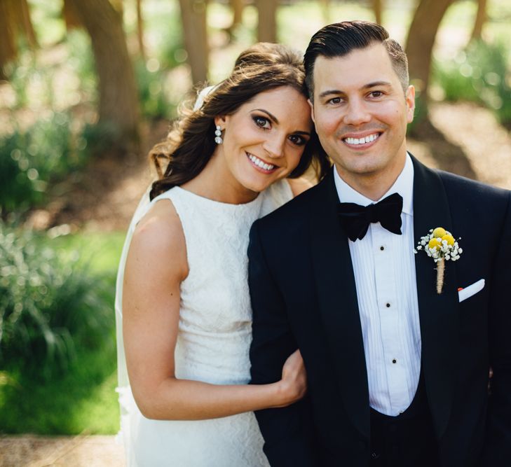 Bride in Pronovias Ornani Bridal Gown & Veil | Groom in Charles Tyrwitt Midnight Blue Tuxedo | Industrial Wedding at The West Mill Venue | Sarah Gray Photography