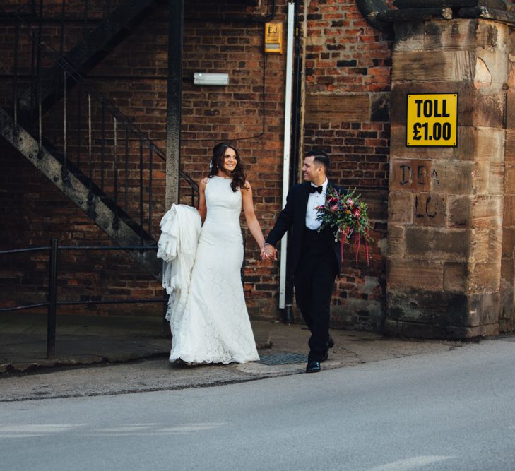 Bride in Pronovias Ornani Bridal Gown & Veil | Groom in Charles Tyrwitt Midnight Blue Tuxedo | Industrial Wedding at The West Mill Venue | Sarah Gray Photography