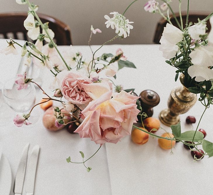 Delicate Blush Flower & Fruit Table Centrepiece | Relaxed Wedding at St John Bread & Wine | Jason Williams Photography