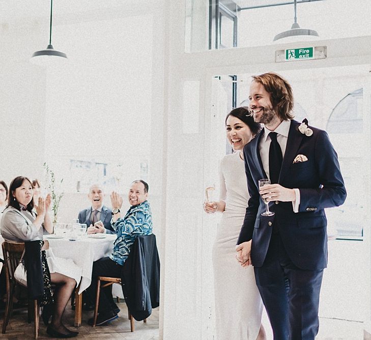 Stylish Bride in Givency Gown | Groom in Suit Supply | St John Bread & Wine Wedding | Jason Williams Photography