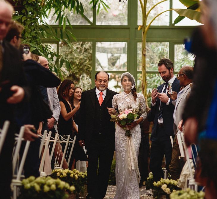 Glasshouse Wedding Ceremony | Bride in Bespoke Hermione de Paula Bridal Gown | Groom in Thomas Farthing | Stylish Destination Wedding in Marrakesh | Andy Gaines Photography