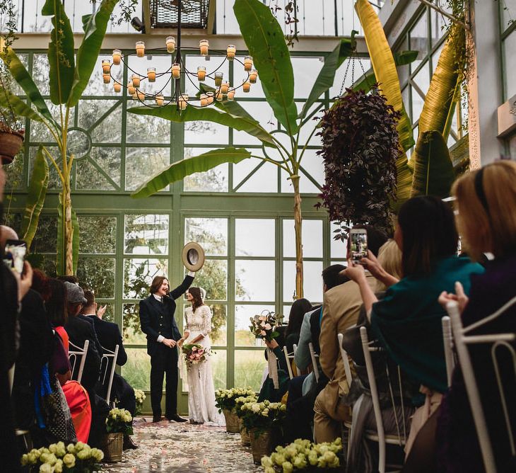 Glasshouse Wedding Ceremony | Bride in Bespoke Hermione de Paula Bridal Gown | Groom in Thomas Farthing | Stylish Destination Wedding in Marrakesh | Andy Gaines Photography