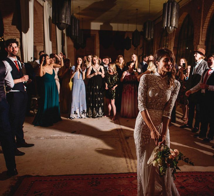 Bouquet Toss with Bride in Bespoke Hermione de Paula Bridal Gown | Stylish Destination Wedding in Marrakesh | Andy Gaines Photography