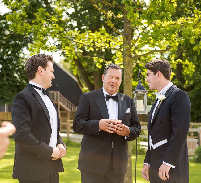 Groom in Black Tie Suit | Rustic Soho Farmhouse Ceremony with PapaKata Sperry Tent Greenery filled Reception | Marianne Taylor Photography | Will Warr Films