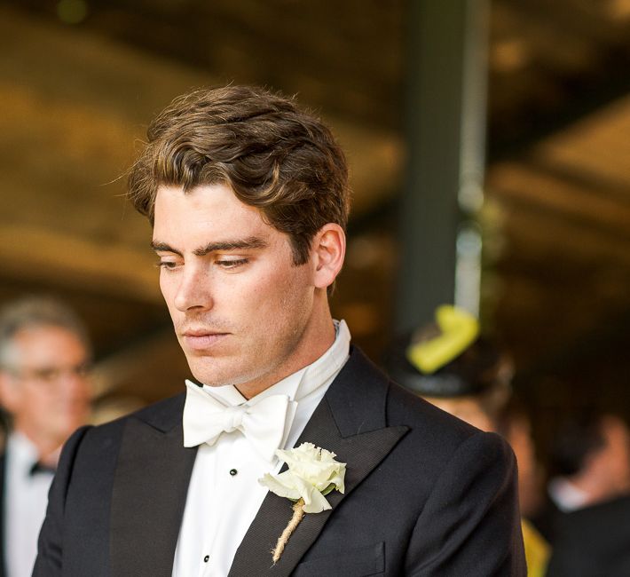 Groom in Black Tie Suit | Rustic Soho Farmhouse Ceremony with PapaKata Sperry Tent Greenery filled Reception | Marianne Taylor Photography | Will Warr Films