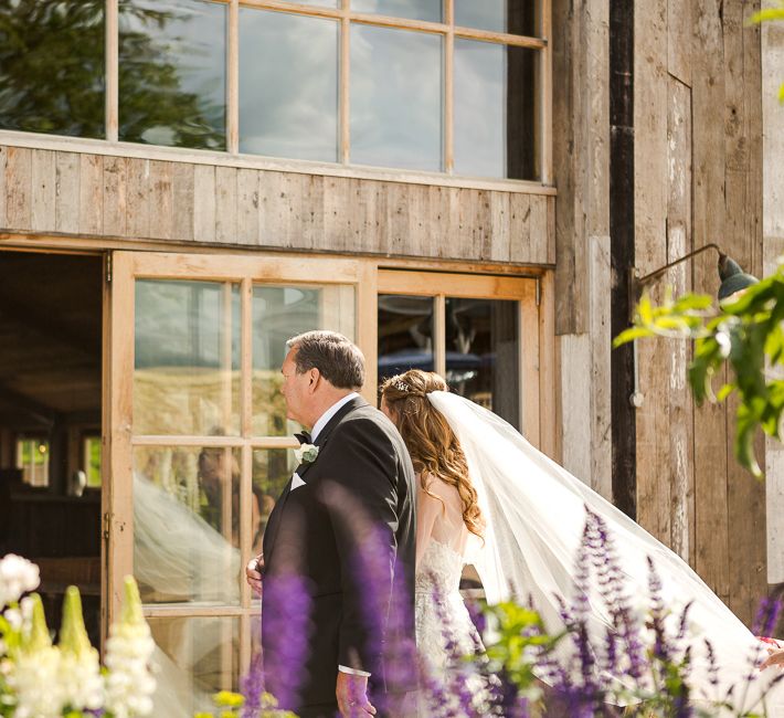 Bride in Mira Zwillinger Bridal Gown | Rustic Soho Farmhouse Ceremony with PapaKata Sperry Tent Greenery filled Reception | Marianne Taylor Photography | Will Warr Films