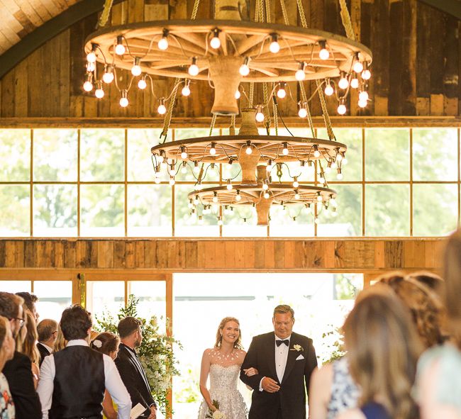 Bride in Mira Zwillinger Bridal Gown | Rustic Soho Farmhouse Ceremony with PapaKata Sperry Tent Greenery filled Reception | Marianne Taylor Photography | Will Warr Films