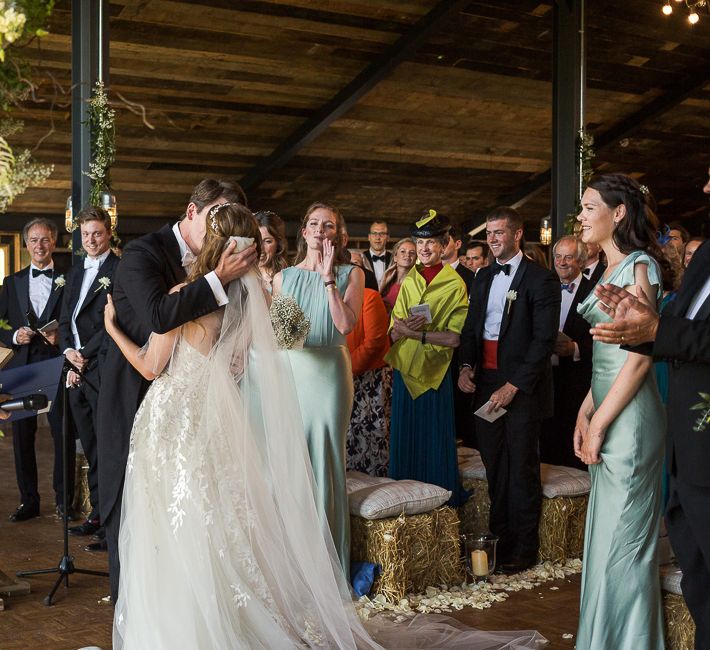 Bride in Mira Zwillinger Bridal Gown | Rustic Soho Farmhouse Ceremony with PapaKata Sperry Tent Greenery filled Reception | Marianne Taylor Photography | Will Warr Films