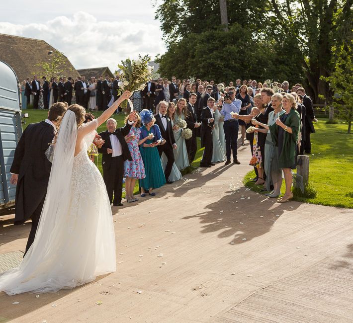 Bride in Mira Zwillinger Bridal Gown | Rustic Soho Farmhouse Ceremony with PapaKata Sperry Tent Greenery filled Reception | Marianne Taylor Photography | Will Warr Films