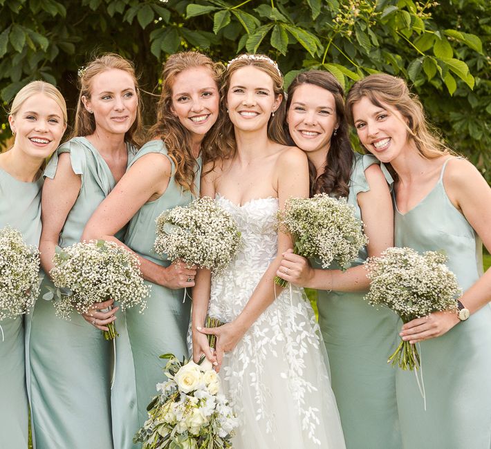 Bride in Mira Zwillinger Bridal Gown | Pale Green Ghost Bridesmaid Dresses | Rustic Soho Farmhouse Ceremony with PapaKata Sperry Tent Greenery filled Reception | Marianne Taylor Photography | Will Warr Films