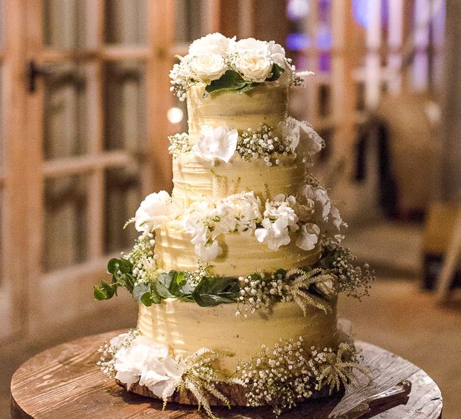 Buttercream Icing Wedding Cake | Rustic Soho Farmhouse Ceremony with PapaKata Sperry Tent Greenery filled Reception | Marianne Taylor Photography | Will Warr Films