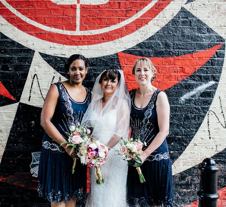 Bridesmaids In Navy Flapper Dresses // Vintage Inspired Wedding With 20s & 30s Influences In London At Shoreditch Studios With Images From Beatrici Photography And Styling By The Barnables