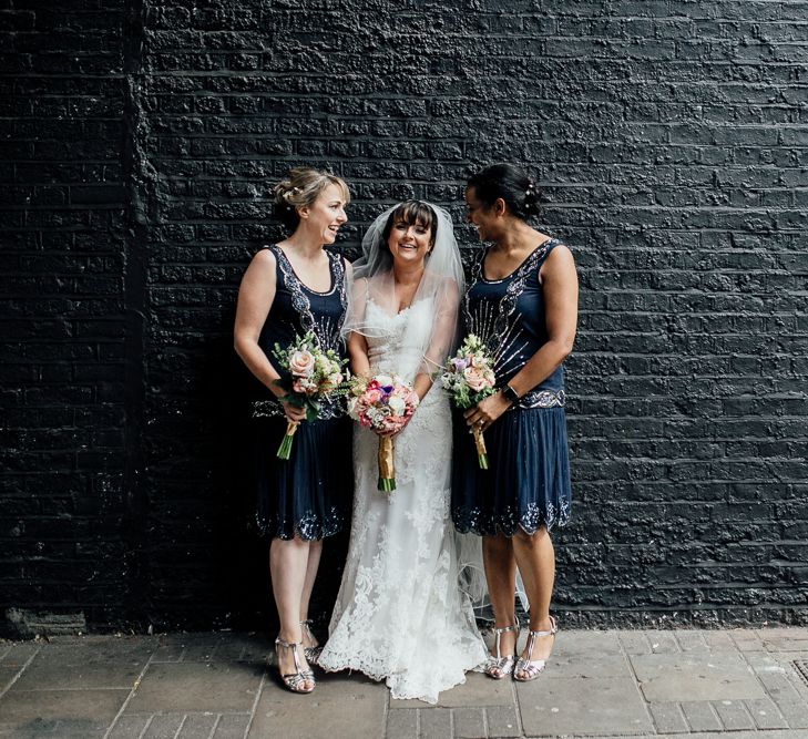 Bridesmaids In Navy Flapper Dresses // Vintage Inspired Wedding With 20s & 30s Influences In London At Shoreditch Studios With Images From Beatrici Photography And Styling By The Barnables