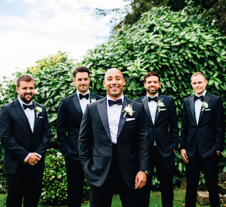 Groomsmen In Black Tie | St Donat's Castle Wedding With Pink & Gold Colour Scheme | Images by Steve Gerrard Photography