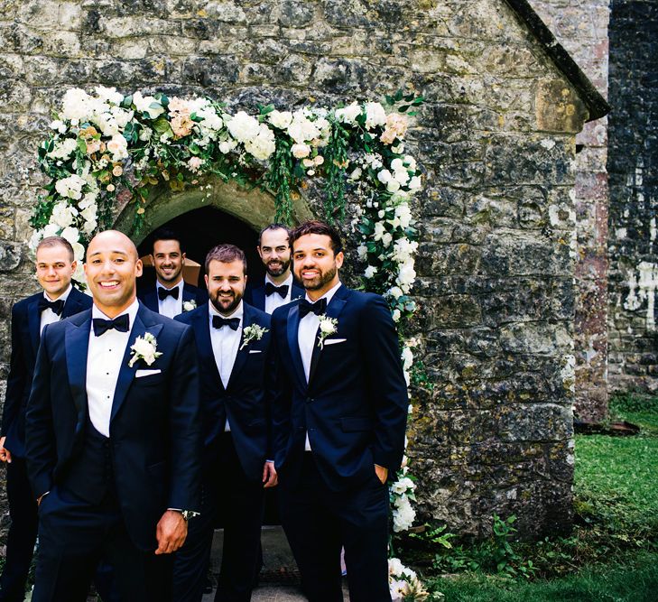 Groom & Groomsmen In Black Tie | St Donat's Castle Wedding With Pink & Gold Colour Scheme | Images by Steve Gerrard Photography