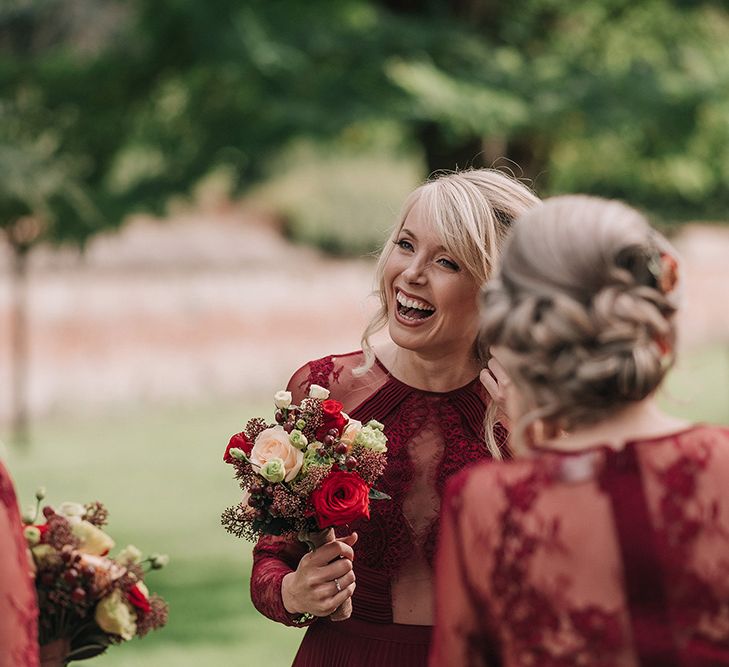 Bridesmaids in Red ASOS Dresses | DIY Lord of the Rings Themed Wedding at Monks Barn in Maidenhead | Jason Mark Harris Photography | Cinematic Films By J