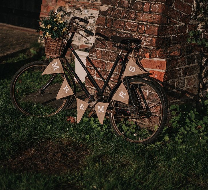 Vintage Bicycle with Bunting Sign | DIY Lord of the Rings Themed Wedding at Monks Barn in Maidenhead | Jason Mark Harris Photography | Cinematic Films By J