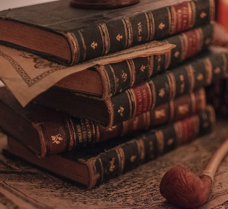 Vintage Books Wedding Decor | DIY Lord of the Rings Themed Wedding at Monks Barn in Maidenhead | Jason Mark Harris Photography | Cinematic Films By J