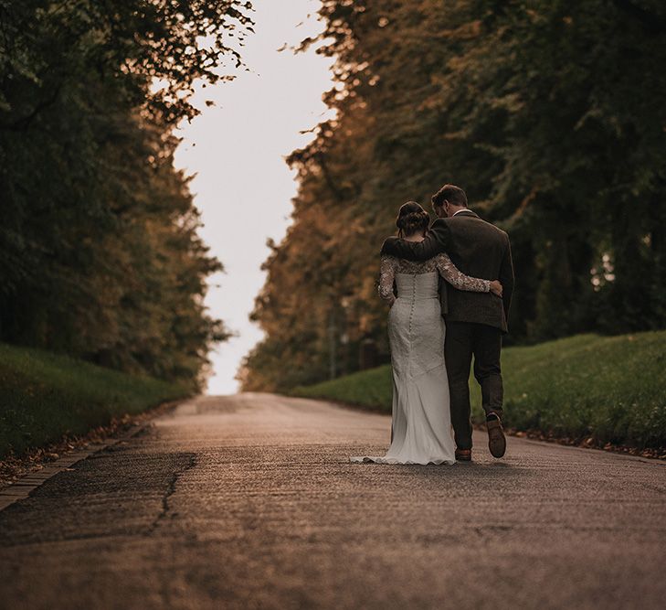 Bride in Lisa Donetti Adriana Gown | Groom in Tweed Walker Slater Suit | DIY Lord of the Rings Themed Wedding at Monks Barn in Maidenhead | Jason Mark Harris Photography | Cinematic Films By J