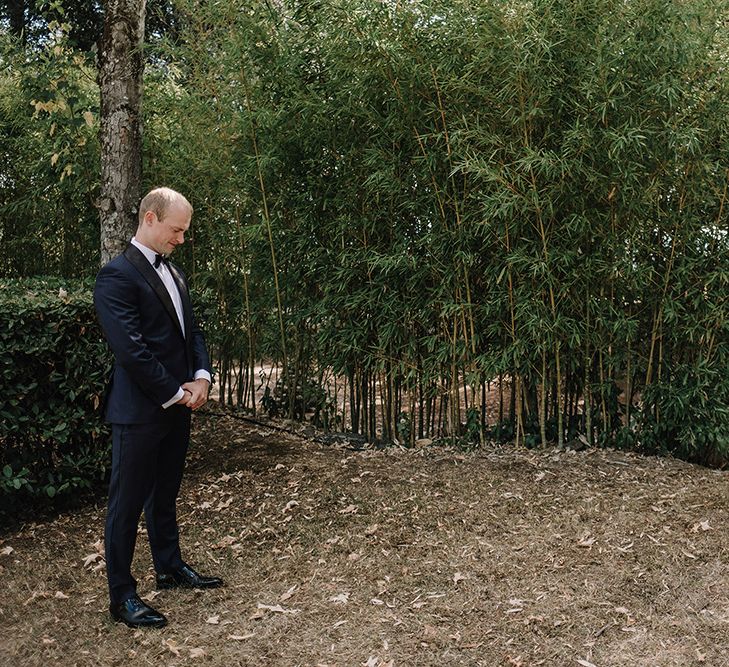 First Look | Bride in Monique Lhuillier Gown | Groom in Tuxedo | Super Luxe Blush, White & Greenery Destination Wedding at Villa Pitiana, Tuscany, Italy | Jason Mark Harris Photography | Angelo La Torre Film