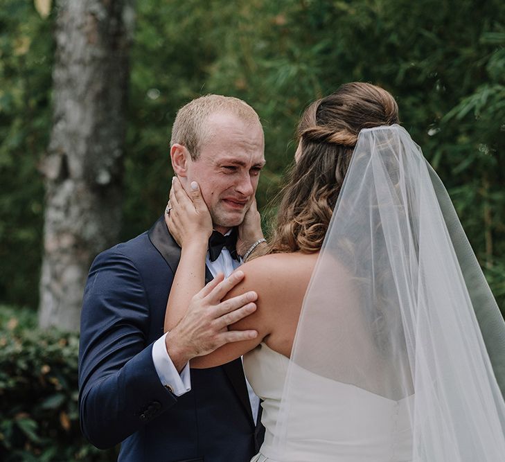 First Look | Bride in Monique Lhuillier Gown | Groom in Tuxedo | Super Luxe Blush, White & Greenery Destination Wedding at Villa Pitiana, Tuscany, Italy | Jason Mark Harris Photography | Angelo La Torre Film