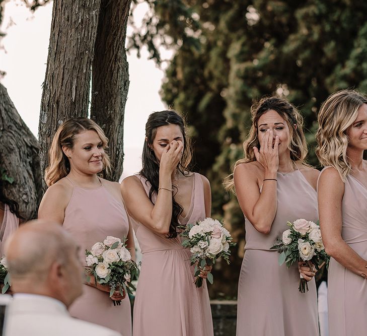 Emotional Bridesmaids in Pink Monique Lhulillier Gown | Super Luxe Blush, White & Greenery Destination Wedding at Villa Pitiana, Tuscany, Italy | Jason Mark Harris Photography | Angelo La Torre Film