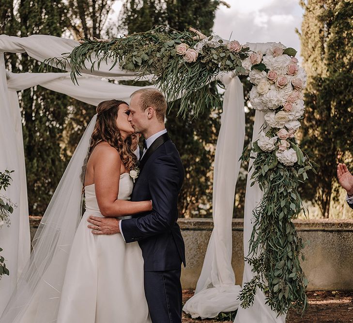 Wedding Ceremony | Bride in Monique Lhuillier Gown | Groom in Tuxedo | Super Luxe Blush, White & Greenery Destination Wedding at Villa Pitiana, Tuscany, Italy | Jason Mark Harris Photography | Angelo La Torre Film