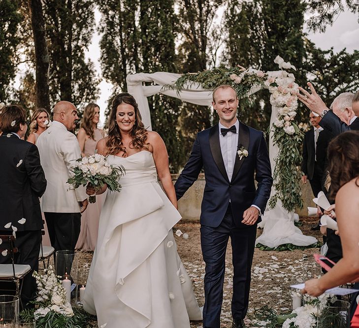 Wedding Ceremony | Bride in Monique Lhuillier Gown | Groom in Tuxedo | Super Luxe Blush, White & Greenery Destination Wedding at Villa Pitiana, Tuscany, Italy | Jason Mark Harris Photography | Angelo La Torre Film