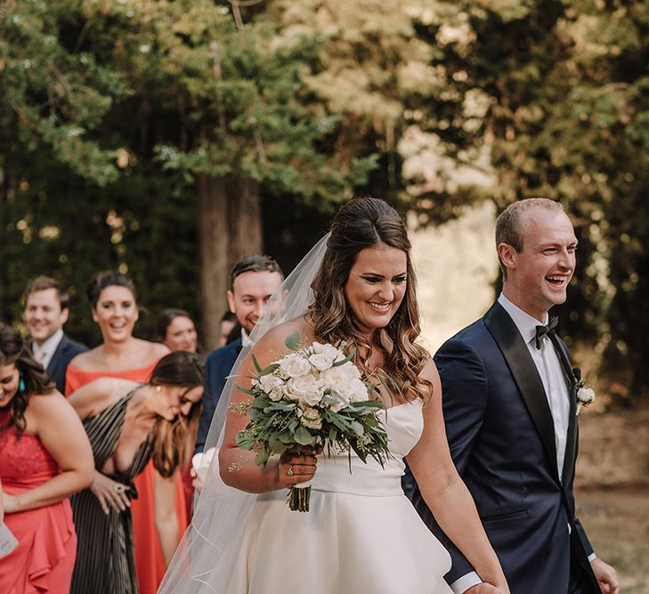 Wedding Ceremony | Bride in Monique Lhuillier Gown | Groom in Tuxedo | Super Luxe Blush, White & Greenery Destination Wedding at Villa Pitiana, Tuscany, Italy | Jason Mark Harris Photography | Angelo La Torre Film