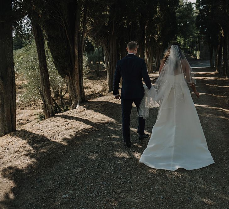 Bride in Monique Lhuillier Gown | Groom in Tuxedo | Super Luxe Blush, White & Greenery Destination Wedding at Villa Pitiana, Tuscany, Italy | Jason Mark Harris Photography | Angelo La Torre Film