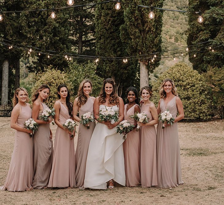 Bride & Bridesmaids in Monique Lhuillier Gowns | Super Luxe Blush, White & Greenery Destination Wedding at Villa Pitiana, Tuscany, Italy | Jason Mark Harris Photography | Angelo La Torre Film