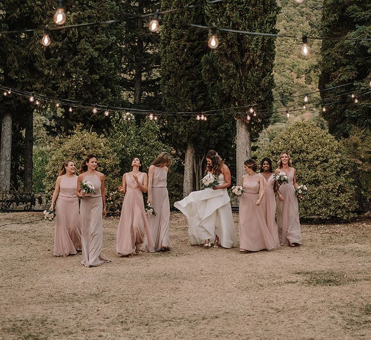 Bride & Bridesmaids in Monique Lhuillier Gowns | Super Luxe Blush, White & Greenery Destination Wedding at Villa Pitiana, Tuscany, Italy | Jason Mark Harris Photography | Angelo La Torre Film