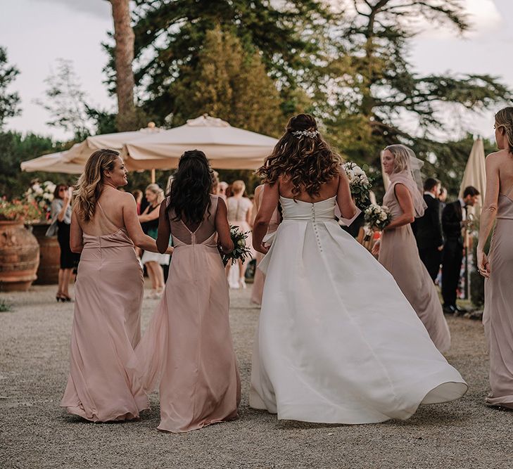 Bride & Bridesmaids in Monique Lhuillier Gowns | Super Luxe Blush, White & Greenery Destination Wedding at Villa Pitiana, Tuscany, Italy | Jason Mark Harris Photography | Angelo La Torre Film