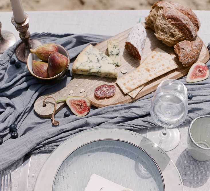 Wedding Tablescape With Grey and Blue Silks and Linens