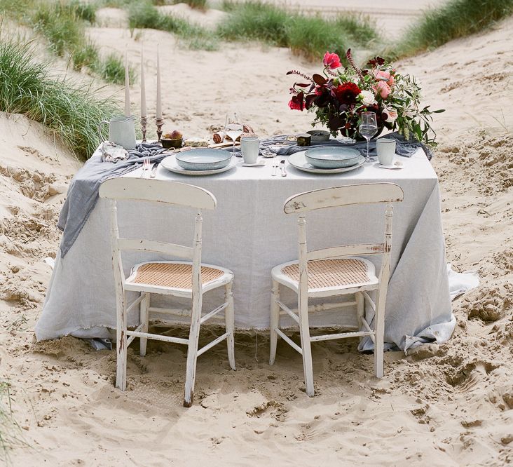 Wedding Tablescape With Grey and Blue Silks and Linens