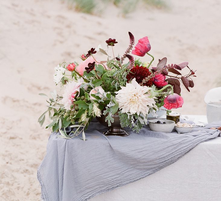 Wedding Tablescape With Grey and Blue Silks and Linens