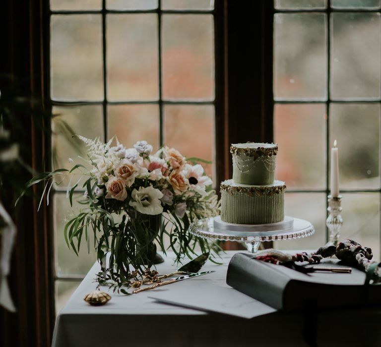 Seafoam Green Wedding Cake With Gold Detail By Peboryon // Magical Winter Elopement Wedding Cornwall With Images By Enchanted Brides Photography & Film By Baxter And Ted With Styling From A Belle & A Brit