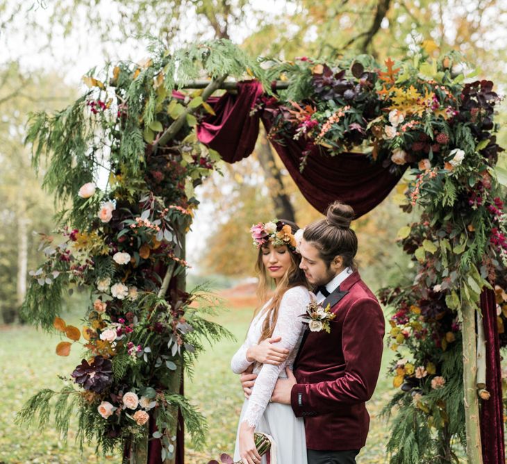 Woodland Floral Arch | Stylish Bride & Groom | Autumnal Decadence Wedding Inspiration at Twyning Park Styled by For The Love of Weddings | Red, Gold & Blush Colour Scheme | Captured by Katrina Photography