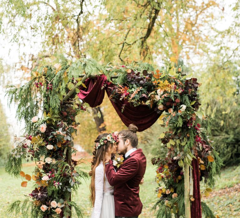 Woodland Floral Arch | Stylish Bride & Groom | Autumnal Decadence Wedding Inspiration at Twyning Park Styled by For The Love of Weddings | Red, Gold & Blush Colour Scheme | Captured by Katrina Photography