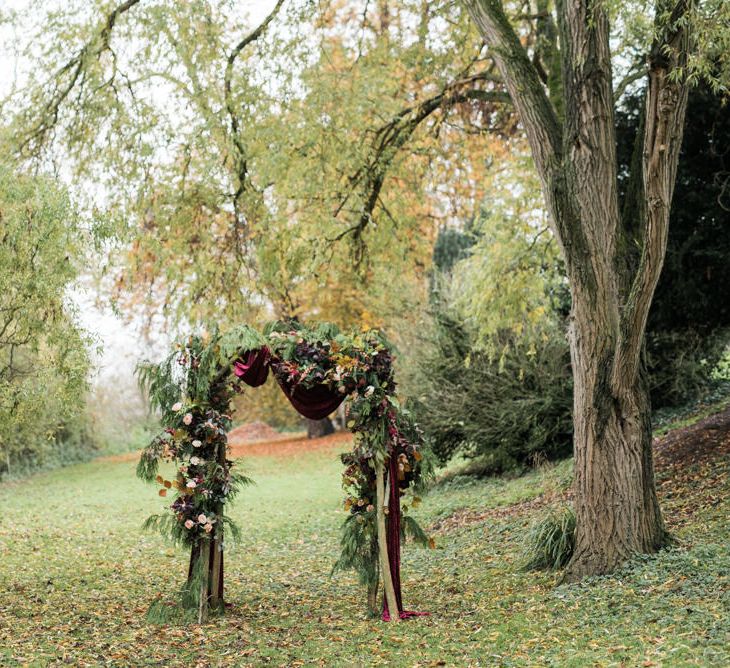 Autumn Floral Arch | Autumnal Decadence Wedding Inspiration at Twyning Park Styled by For The Love of Weddings | Red, Gold & Blush Colour Scheme | Captured by Katrina Photography