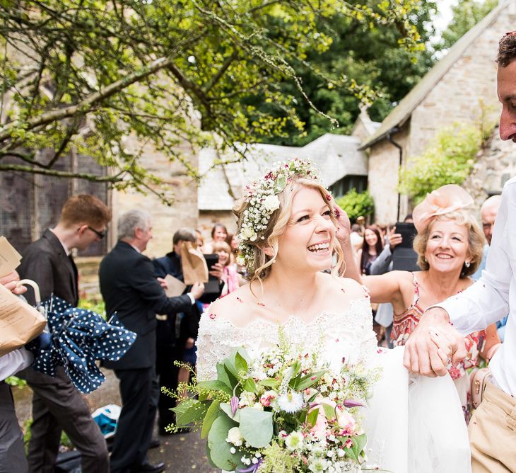 Confetti Moment | Bride in Lace Wedding Dress | Groom in Shorts, Braces & Bow Tie | Coastal Wedding at Driftwood Spas St Agnes, Cornwall | Jessica Grace Photography