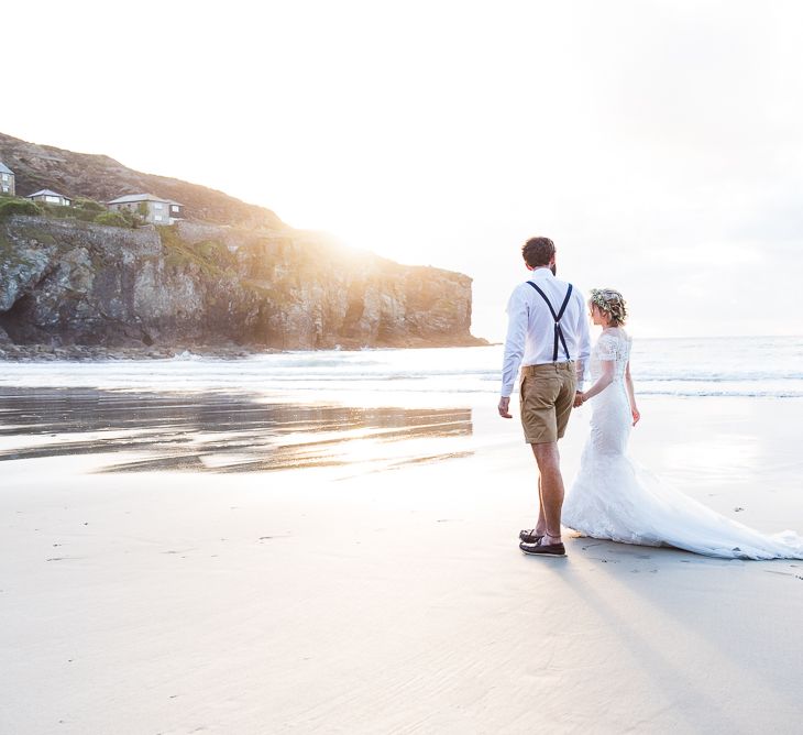 Golden Hour | Bride in Lace Wedding Dress | Groom in Shorts, Braces & Bow Tie | Coastal Wedding at Driftwood Spas St Agnes, Cornwall | Jessica Grace Photography