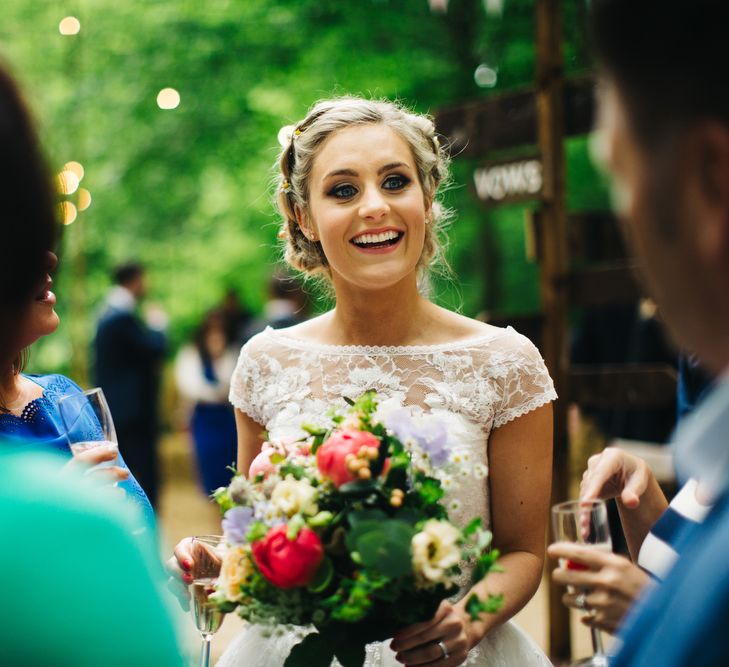 Beautiful Bride with Wild Flower Bouquet