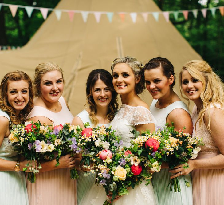 Bride in Short Blue by Enzoani Danbury Gown & Bridesmaid in Ted Baker Dresses