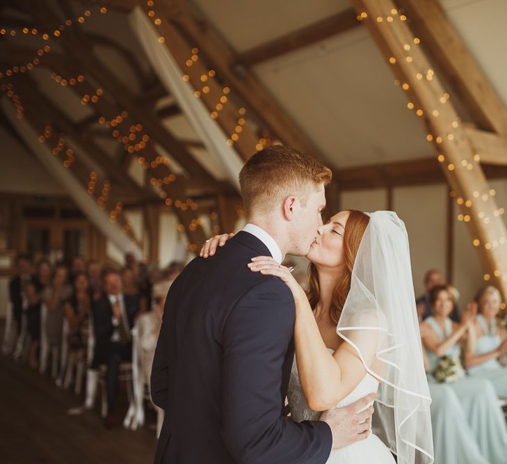 Bride in Stewart Parving Gown & Groom in Reiss Suit Sandburn Hall Yorkshire Wedding Ceremony