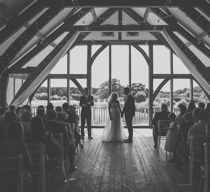 Bride in Stewart Parving Gown & Groom in Reiss Suit Sandburn Hall Yorkshire Wedding Ceremony