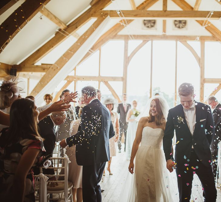 Bride in Stewart Parving Gown & Groom in Reiss Suit Sandburn Hall Yorkshire Wedding Ceremony