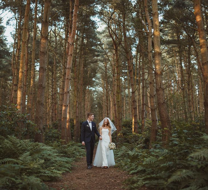 Bride in Stewart Parving Gown & Groom in Reiss Suit at Griffon Forrest in Yorkshire