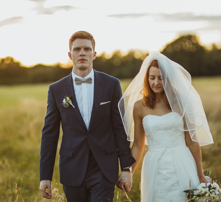 Bride in Stewart Parving Gown & Groom in Reiss Suit at Griffon Forrest in Yorkshire