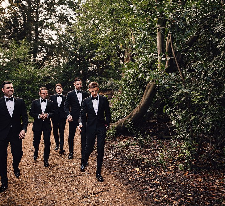 Groomsmen in SuitSupply Tuxedos